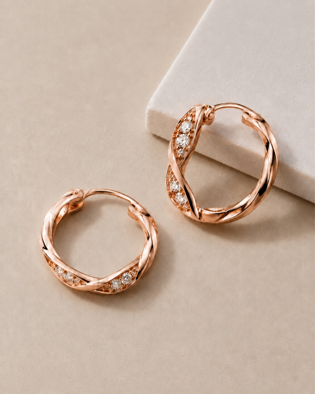 Luminous Twist Rose Gold Hoop Earrings