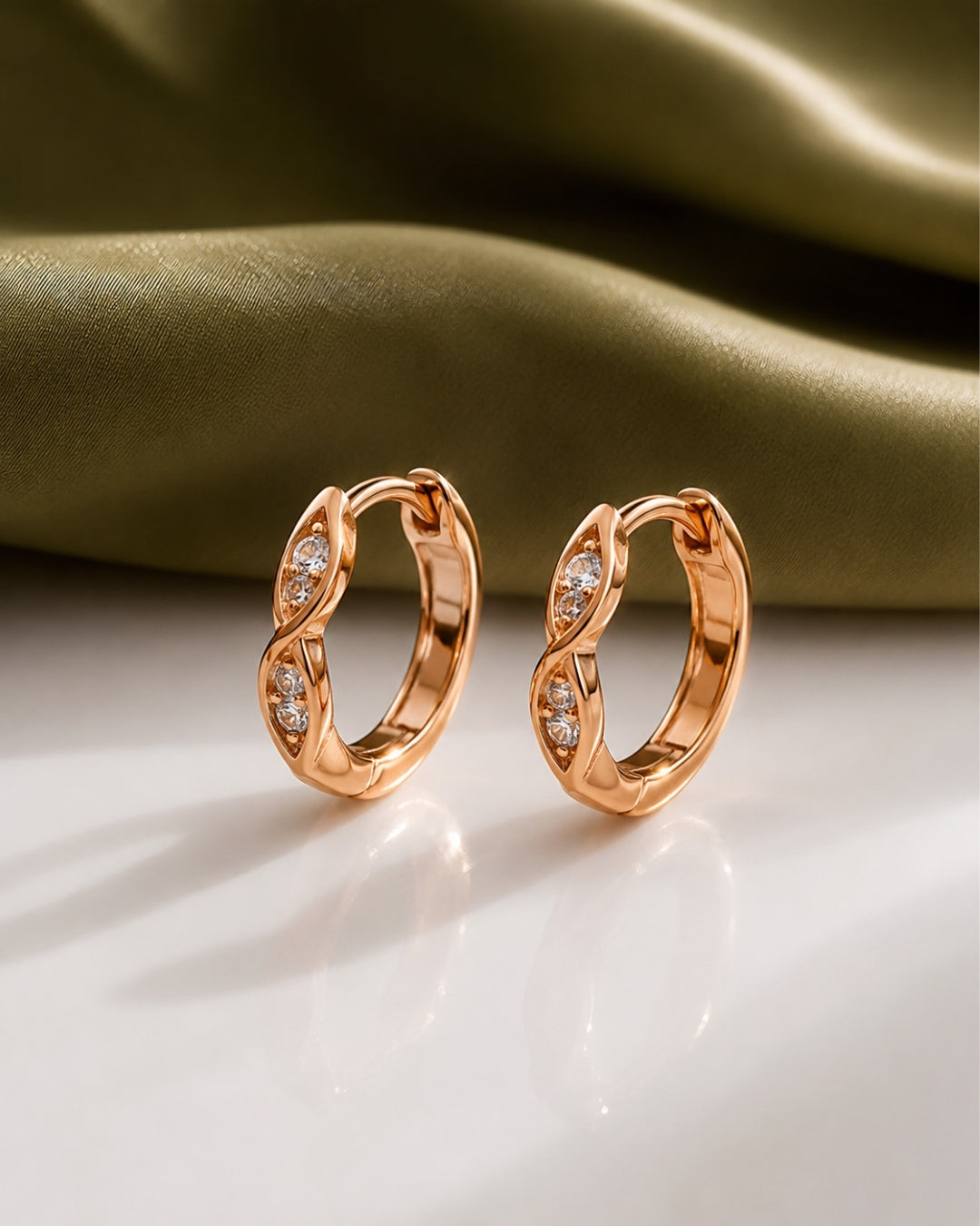 Luminous Twist Rose Gold Hoop Earrings